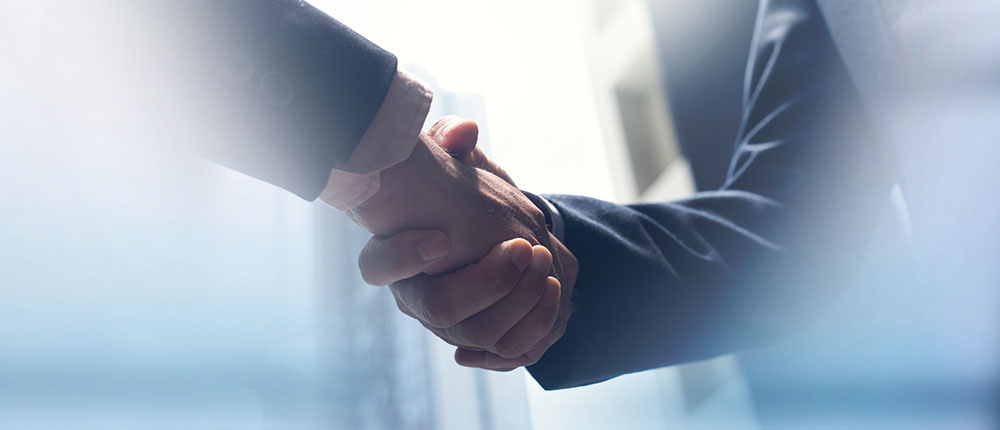 business coaching handshake concept